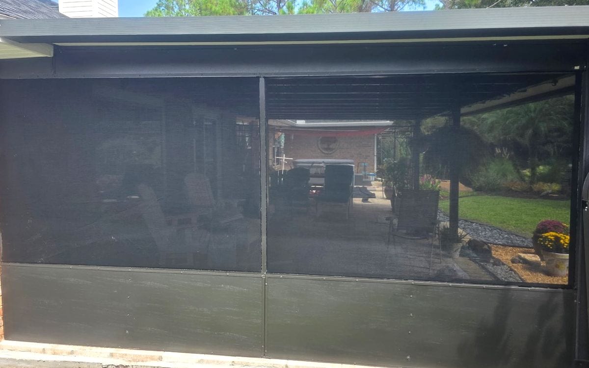 Screened porch enclosure with repaired front panel area